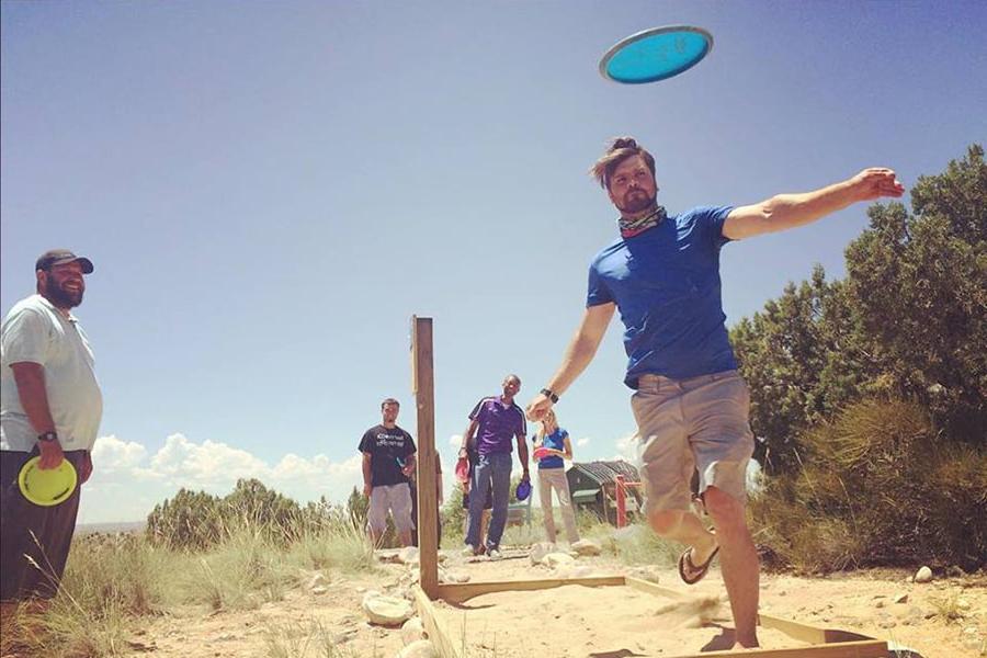 Individual throwing a Disc